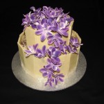 Marbled chocolate shard wedding cake with Singapore Orchids