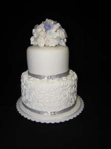 Swirls and roses wedding cake